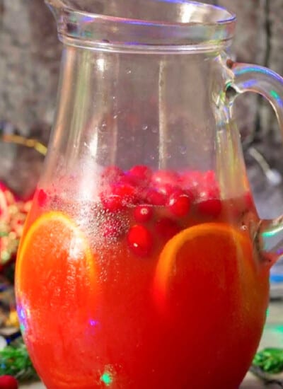 pitcher full of Christmas cranberry punch drink