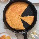 slices of buttermilk cornbread in cast iron pan