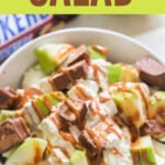 caramel drizzled apple snickers salad in a bowl with text