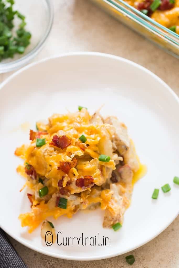 creamy loaded potatoes on plate