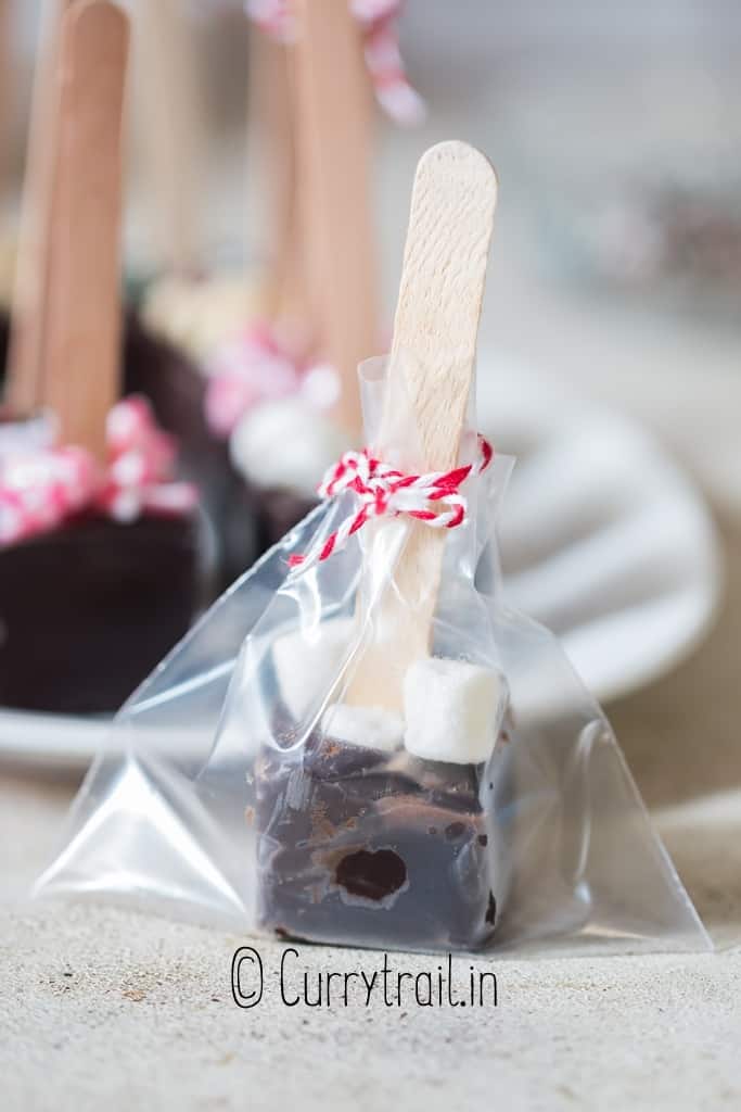 hot cocoa sticks wrapped in plastic for holiday gifting