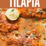 chili lime garlic baked tilapia in a baking tray.