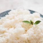 perfectly cooked jasmine rice in bowl with text
