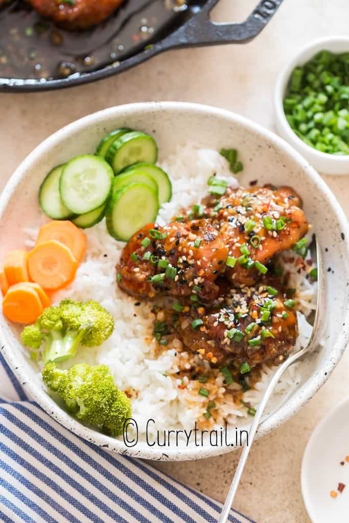 honey garlic chicken with rice in bowl