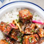 general tso tofu with rice in bowl