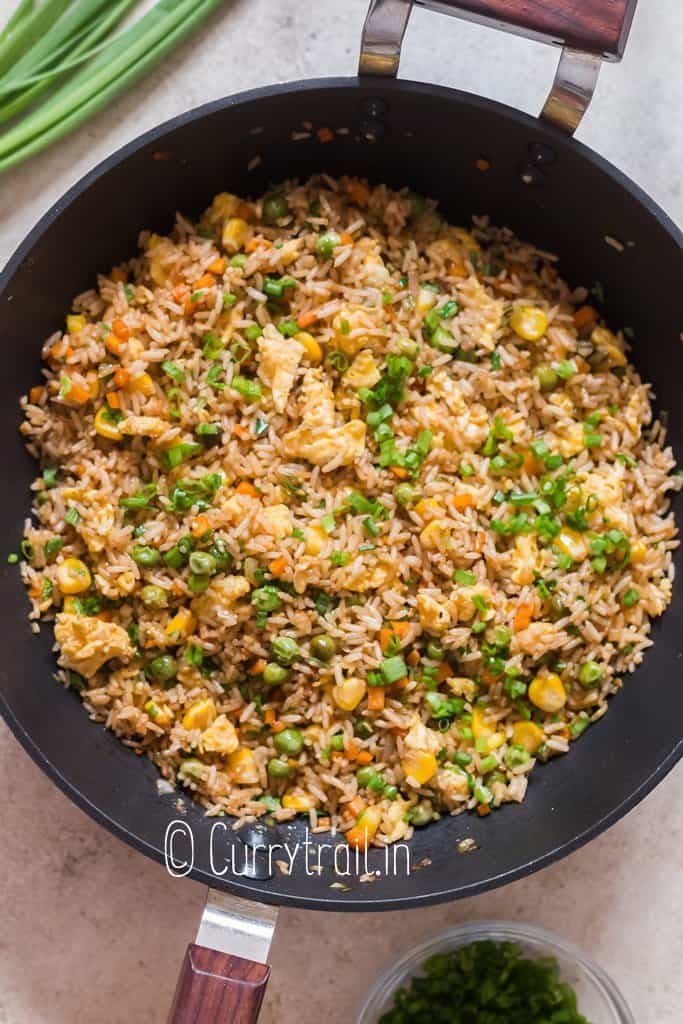 cooking hibachi fried rice in wok