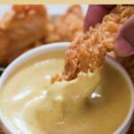 dipping sauce with fried chicken with text