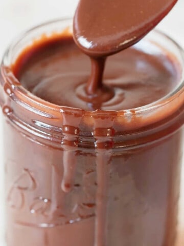 close view of hot fudge sauce in jar