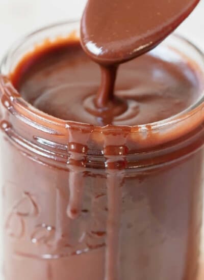 close view of hot fudge sauce in jar