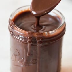 thick fudge sauce in mason jar