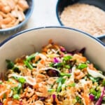 Asian slaw in bowl with text