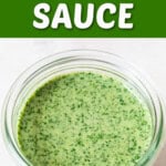 green herb sauce made of cilantro and Greek yogurt in a glass jar.