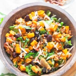 butternut squash salad in wooden bowl