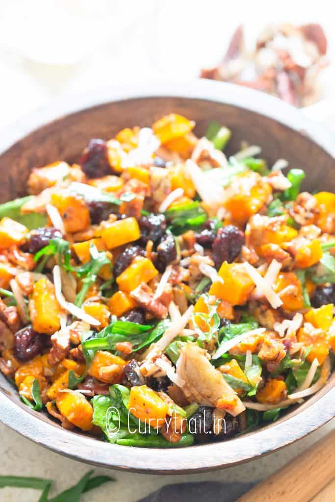 butternut squash salad in wooden bowl