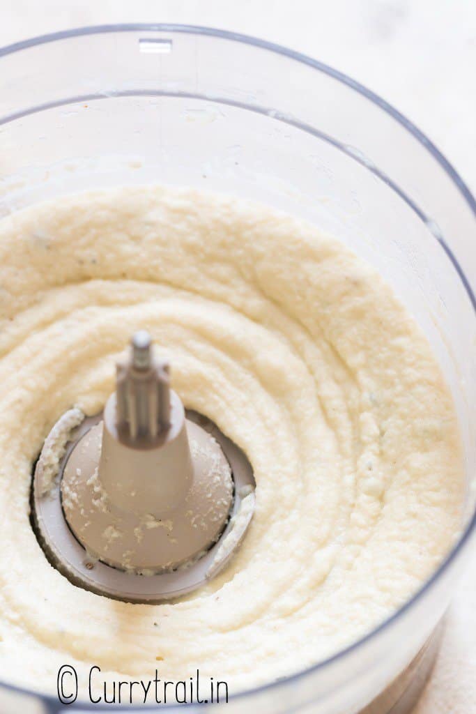 close up view of cauliflower mash in food processor