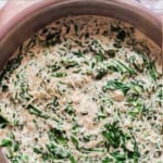 creamed spinach in pan with text