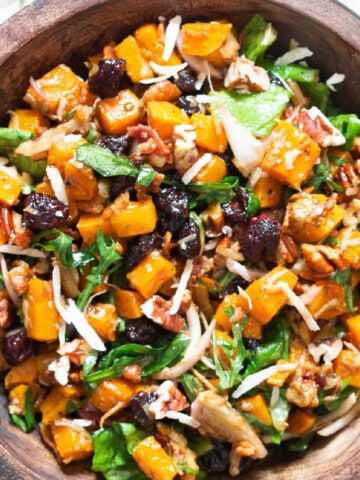 squash fall salad in wooden bowl