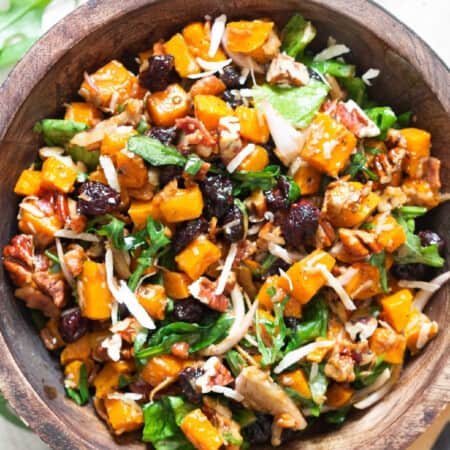 squash fall salad in wooden bowl