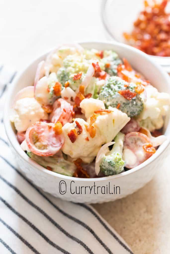 Christmas salad with broccoli and cauliflower with bacon crumbs