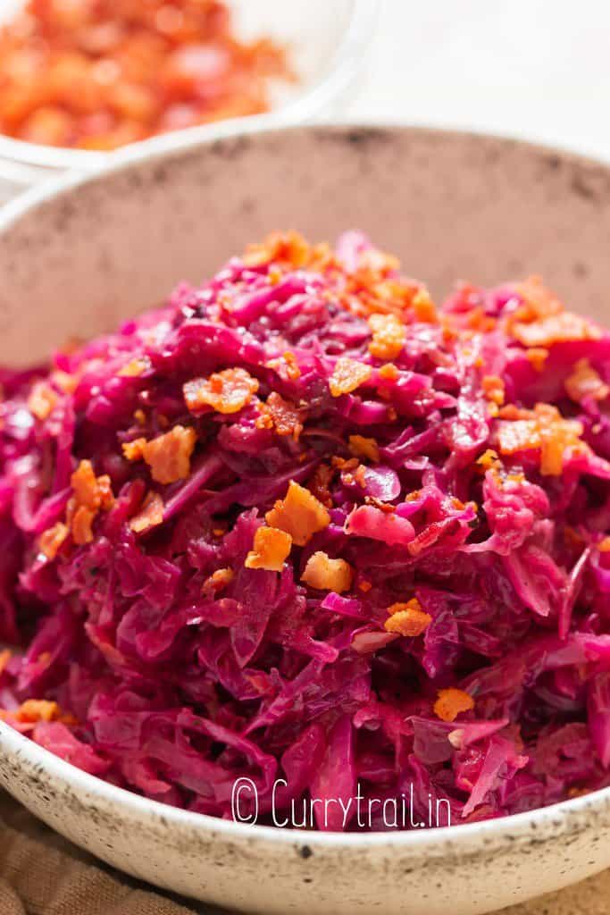 close view of braised red cabbage in white bowl