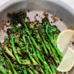 tender broccolini cooked with garlic and lemon with text