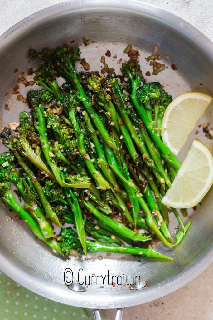sauteed broccolini with garlic and lemon cooked in skillet