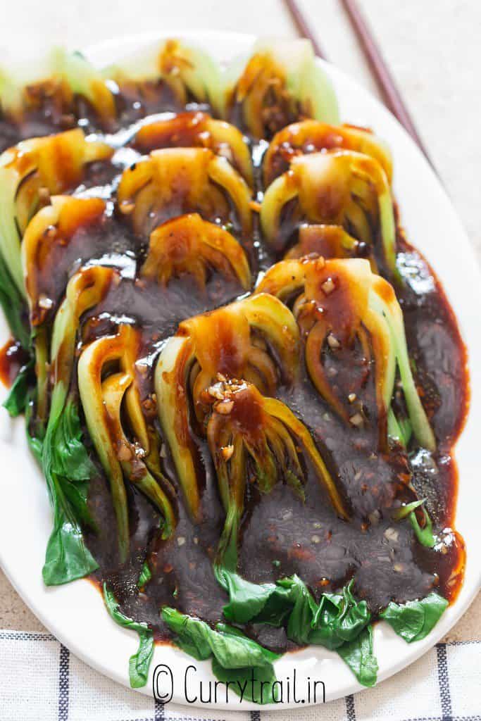 saucy garlic bok choy on plate