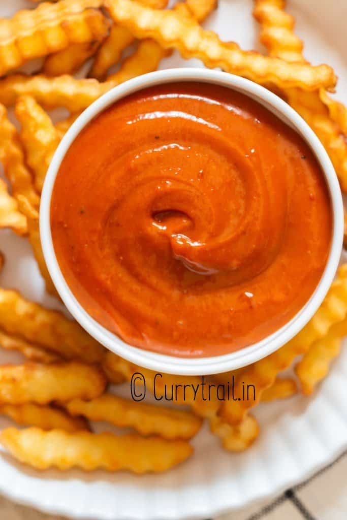 gochujang mayo in small bowl with fries