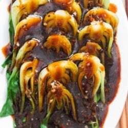 saucy bok choy on plate