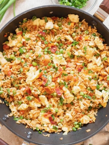 Chinese bacon fried rice cooked in wok