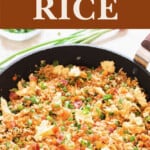 close view of fried rice with bacon cooked in wok with text