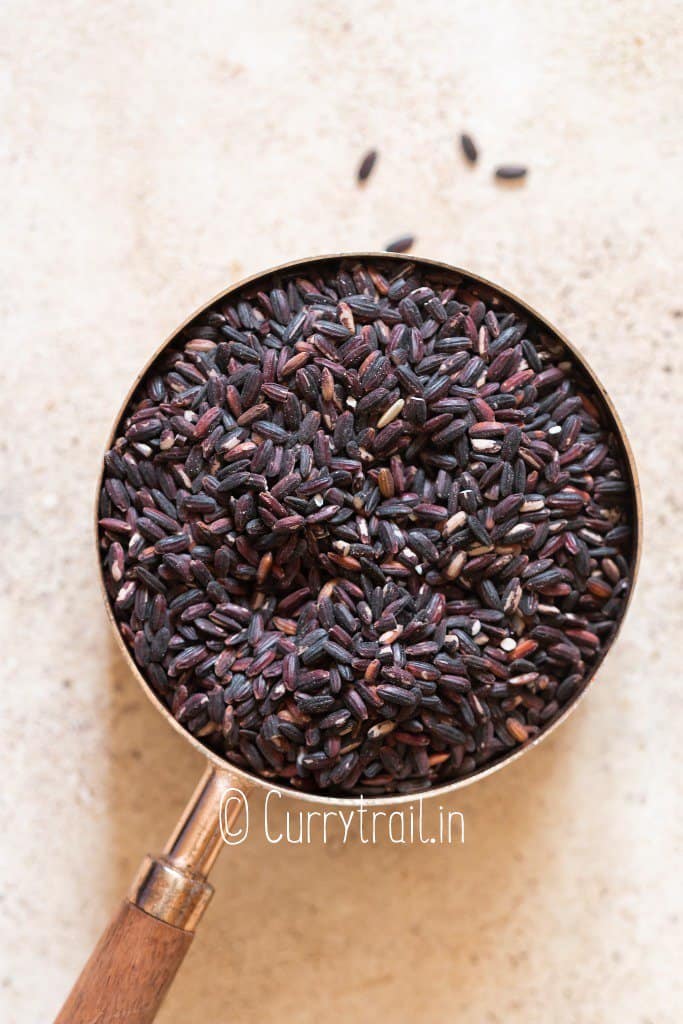black rice in measuring cup