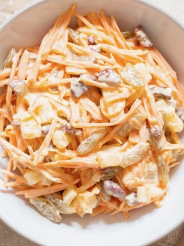 creamy carrot salad in bowl
