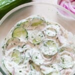 close up view of creamy dill cucumber salad
