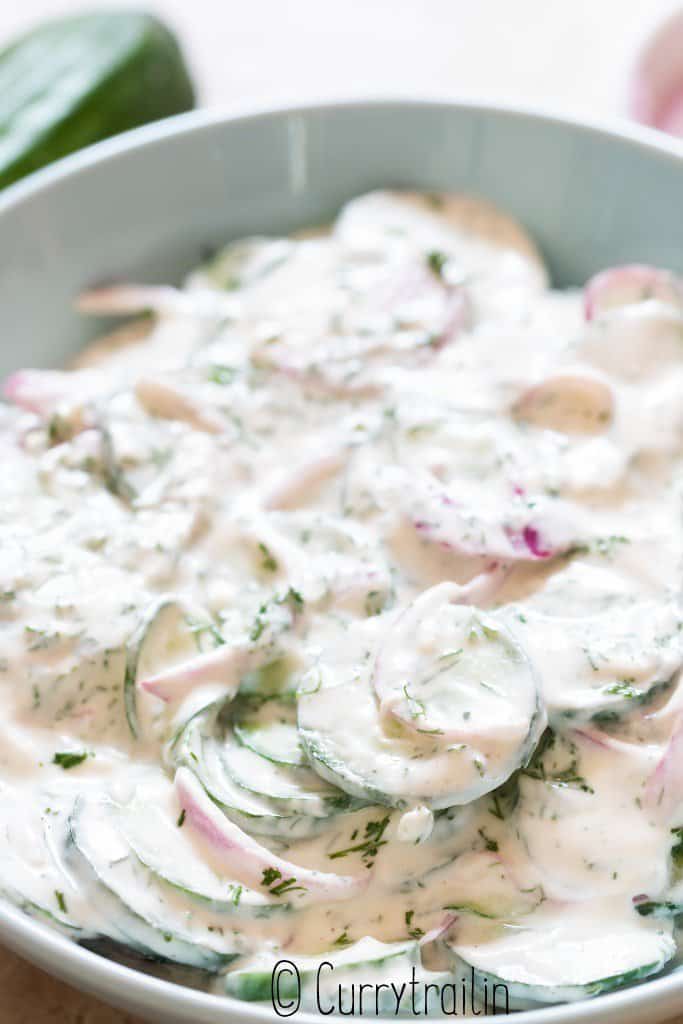 close up view of creamy dill cucumber salad