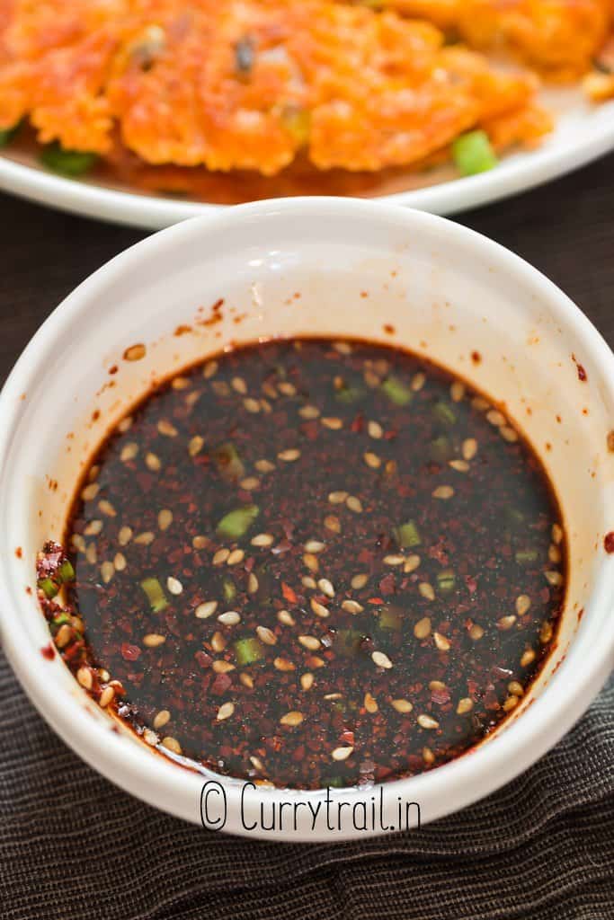 Asian dipping sauce in small bowl