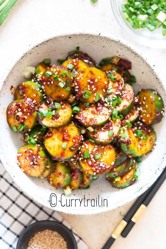 close view of spicy Korean cucumber salad in bowl