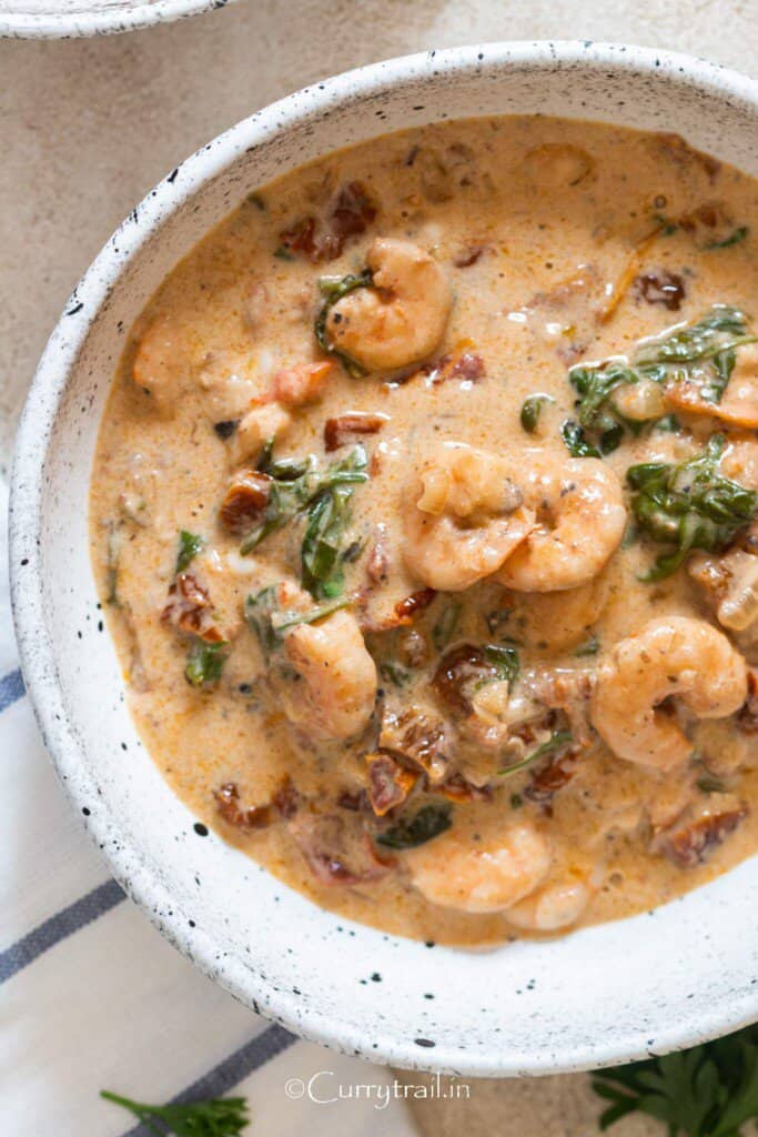 creamy Tuscan shrimp in bowl