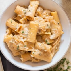 a bowl of creamy French onion pasta