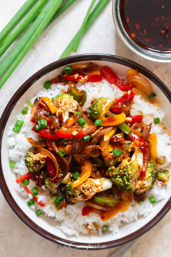 sautéed veggies with garlic sauce with rice