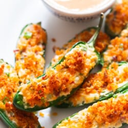 stuffed jalapeno poppers with panko breadcrumb topping in plate