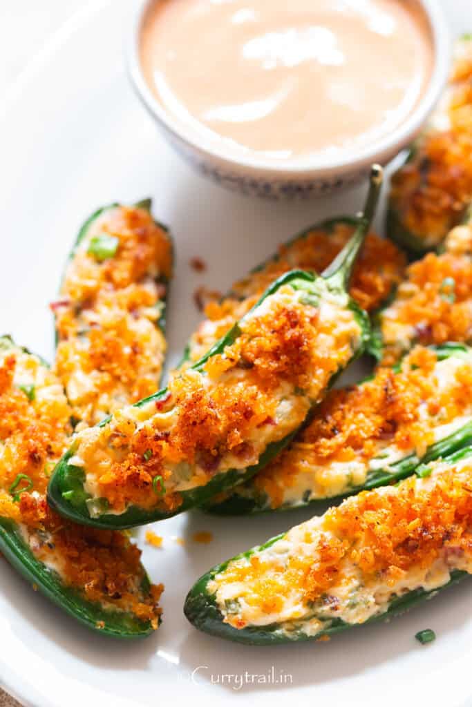 stuffed jalapeno poppers with panko breadcrumb topping in plate