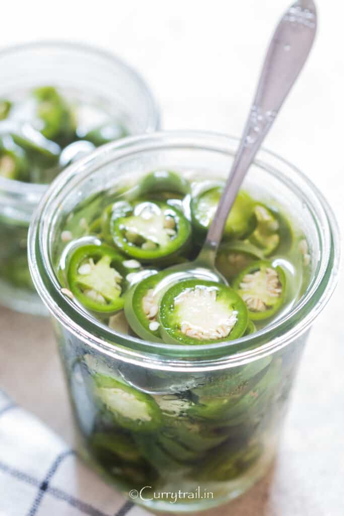 pickled jalapenos in glass jar
