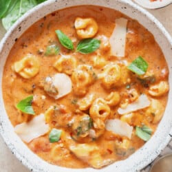 a bowl of tortellini soup