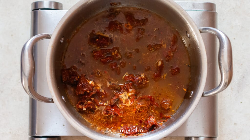 chicken stock added to deglaze the pan with sun-dried tomatoes and seasonings.