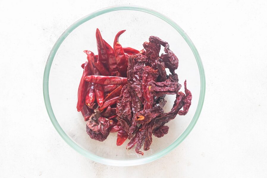 dried red chili peppers in a bowl.