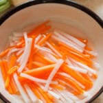 pickled carrot and daikon in a bowl.