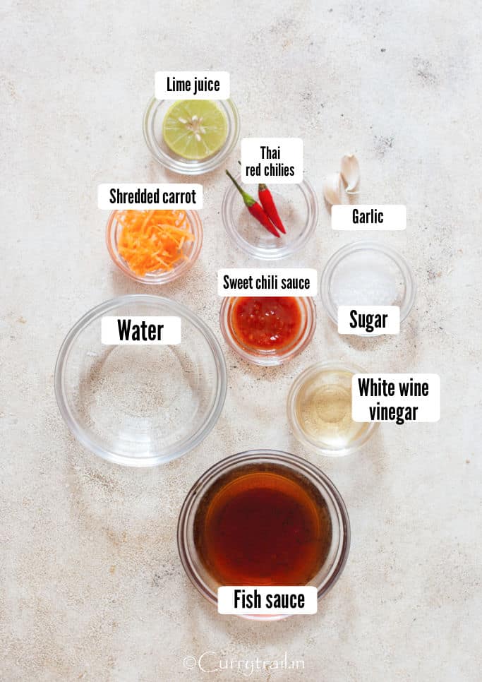 all ingredients for Vietnamese dipping sauce placed on a table.