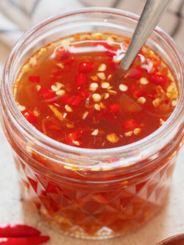 a jar of nuac cham a Vietnamese dipping sauce made of fish sauce.