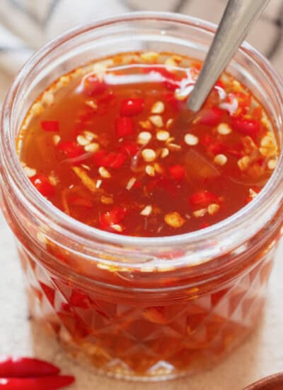 a jar of nuac cham a Vietnamese dipping sauce made of fish sauce.